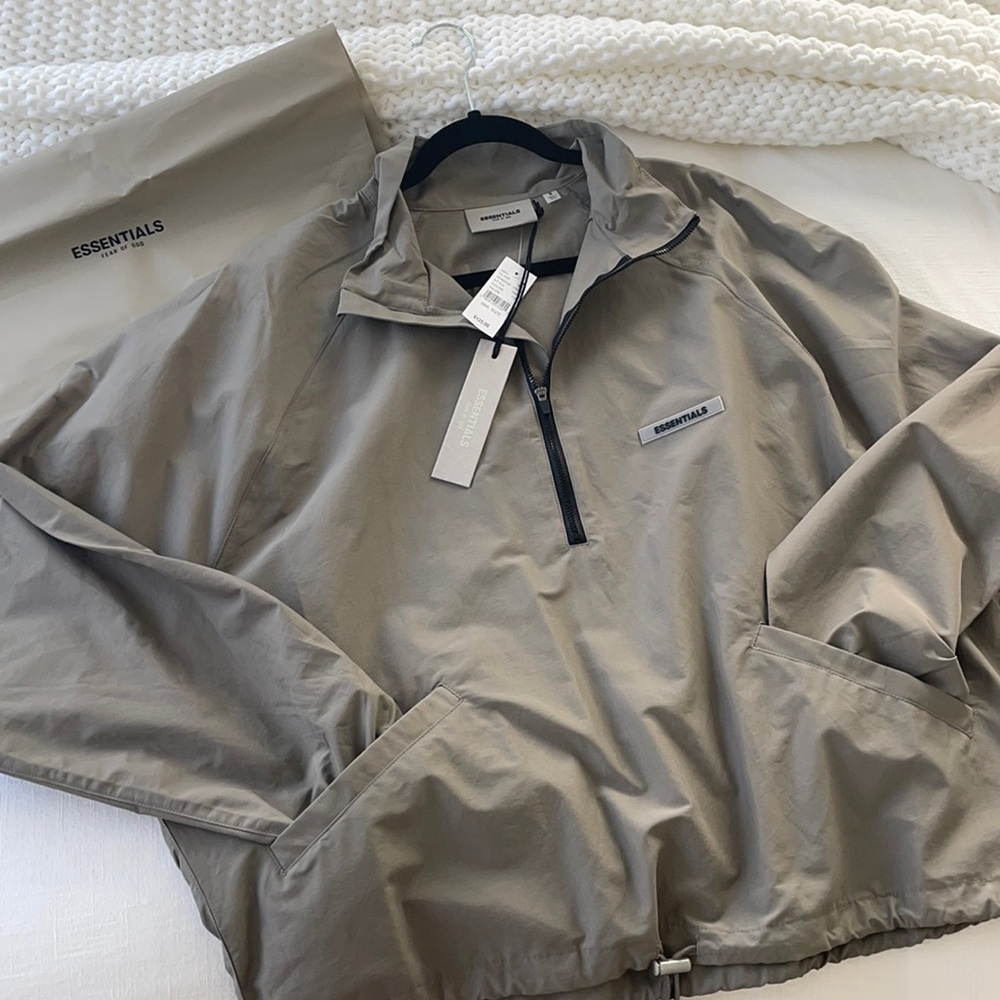 ESSENTIALS windbreaker